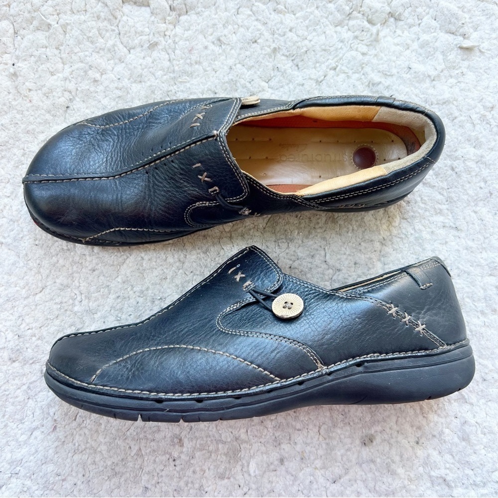 Clarks Unstructured Black Leather Cream Exposed Stitching Un.Loop Slip-On Shoes